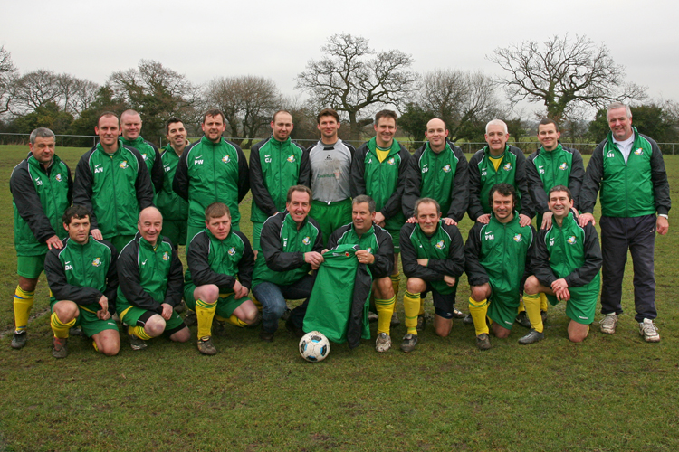 Old Boys receive training tops from Eifion Jones